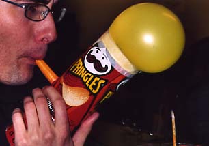 [Instrument made of a Pringles tube and a balloon.]